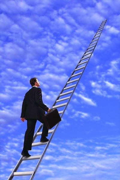 A man climbing a ladder, reaching for something out of view.