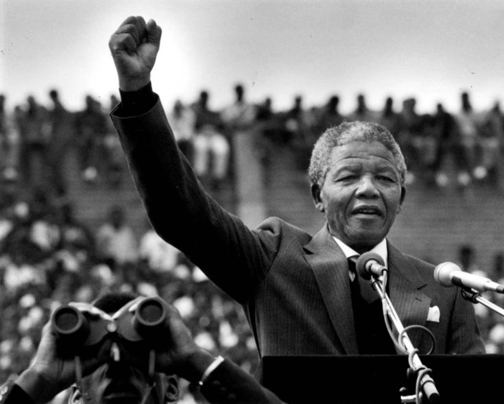 Nelson Mandela delivering a powerful speech, a symbol of mental strength and resilience in the face of adversity.